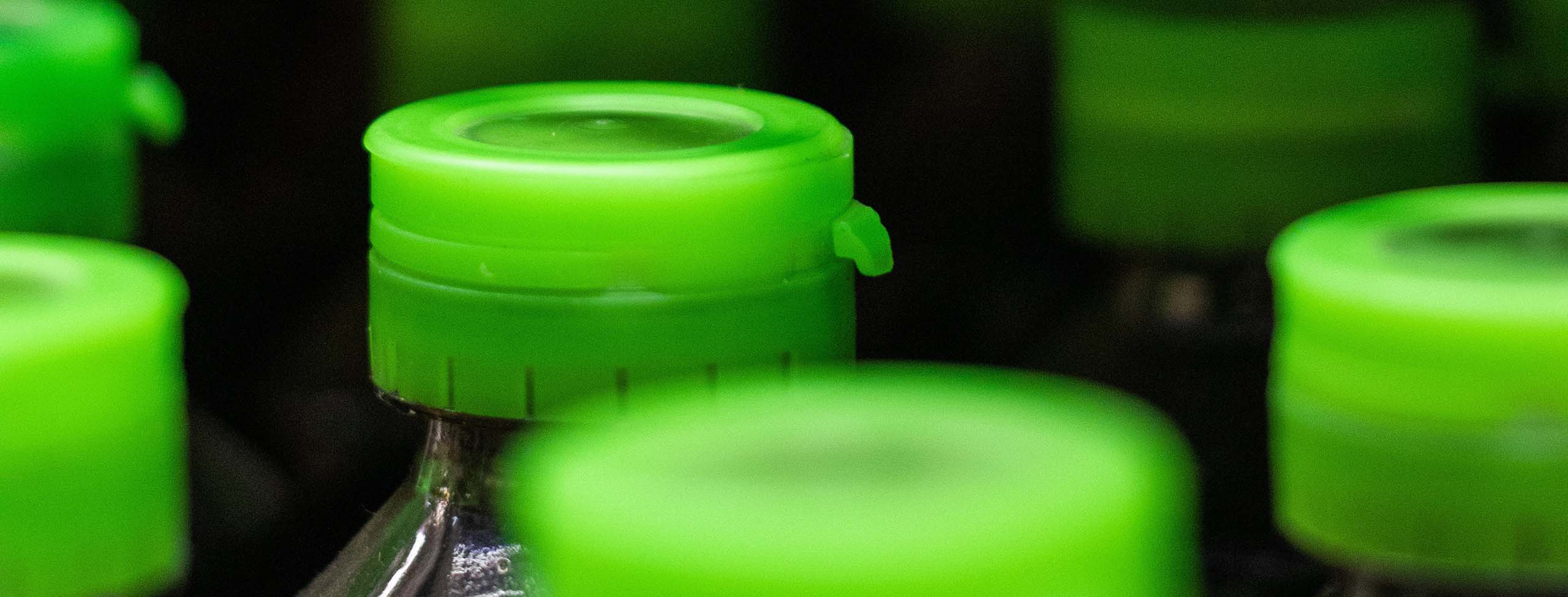 Green bottle tops